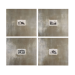 Set of four framed black-and-white architectural building prints with wide champagne silver leaf frames and light brown glaze, displayed in a grid