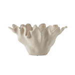 sculptural sand-textured ceramic bowl with a white background
