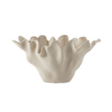 sculptural sand-textured ceramic bowl with a white background