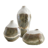 Set of three ceramic vases in earthy brown and ivory tones with organic drip glaze, available in varying sizes and shapes
