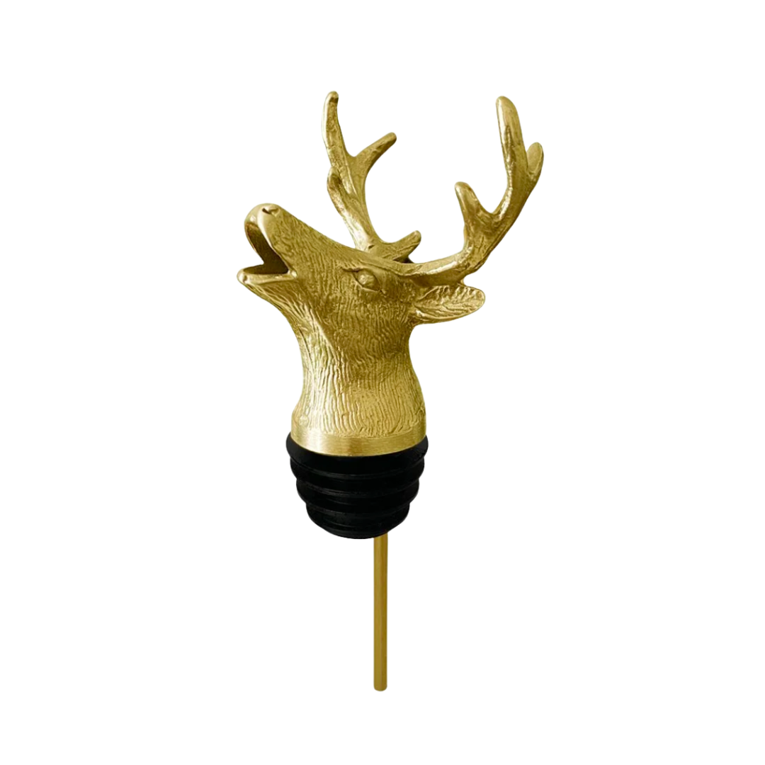 Gold deer head bottle stopper on a white background
