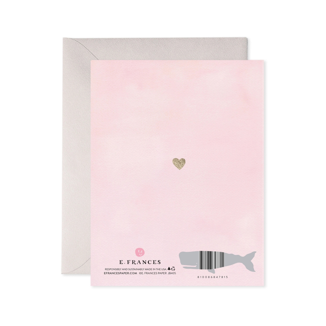Pink card with a gold heart and gray envelope on a white background
