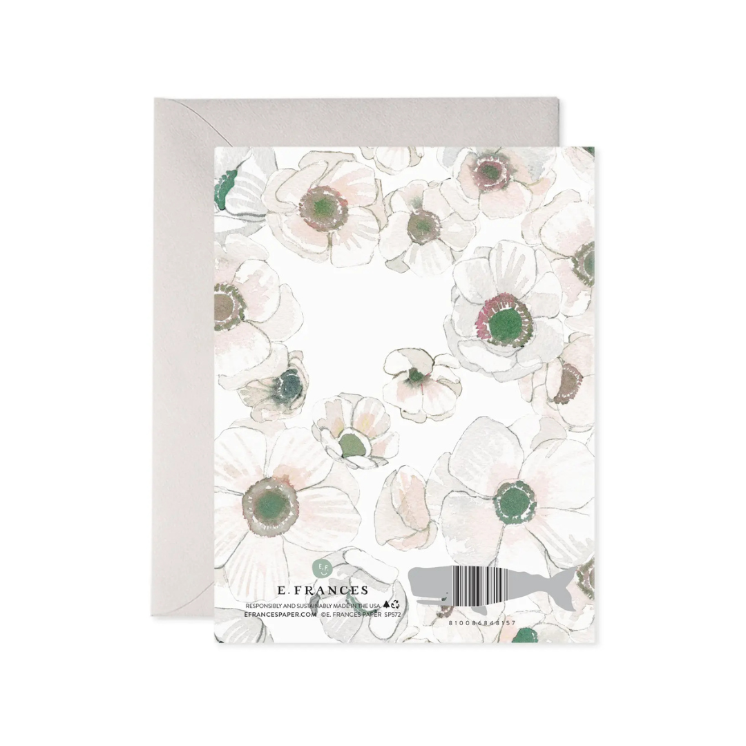 Floral patterned card with a gray envelope on a white background
