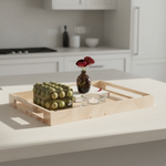 Wooden tray with decorative items including candles and a vase on a white background