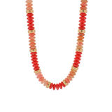 Necklace with red and gold beads on a white background