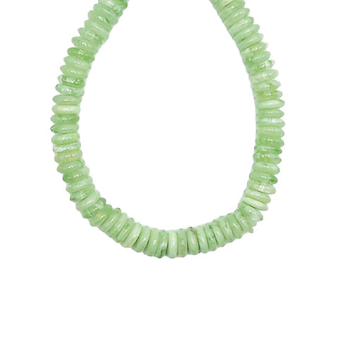 Necklace with light green beads on a white background