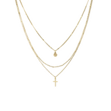 three  gold necklaces with pendants on a white background