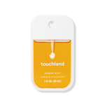 Touchland power mist hand sanitizer packaging on a white background