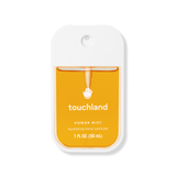 Touchland power mist hand sanitizer packaging on a white background