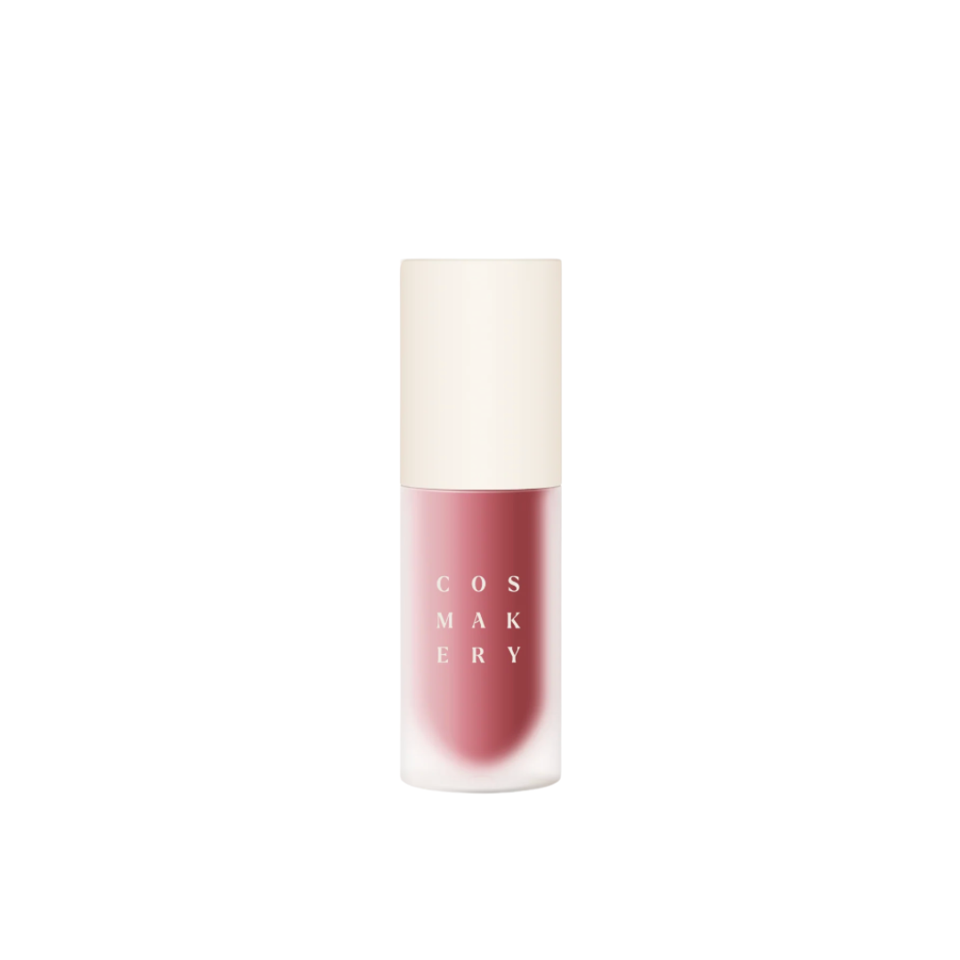 Cosmetics bottle with a pink shade on a white background