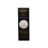 Box of L'Avant Collective wool dryer balls on a white background