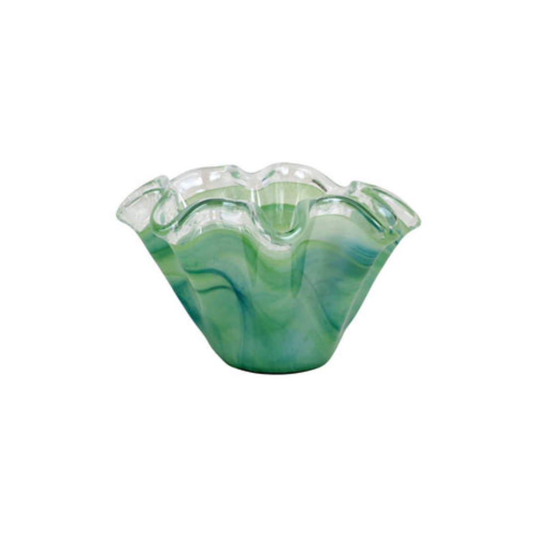 Green glass vase with wavy design on a white background