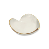 Heart-shaped ceramic dish with gold rim on a white background
