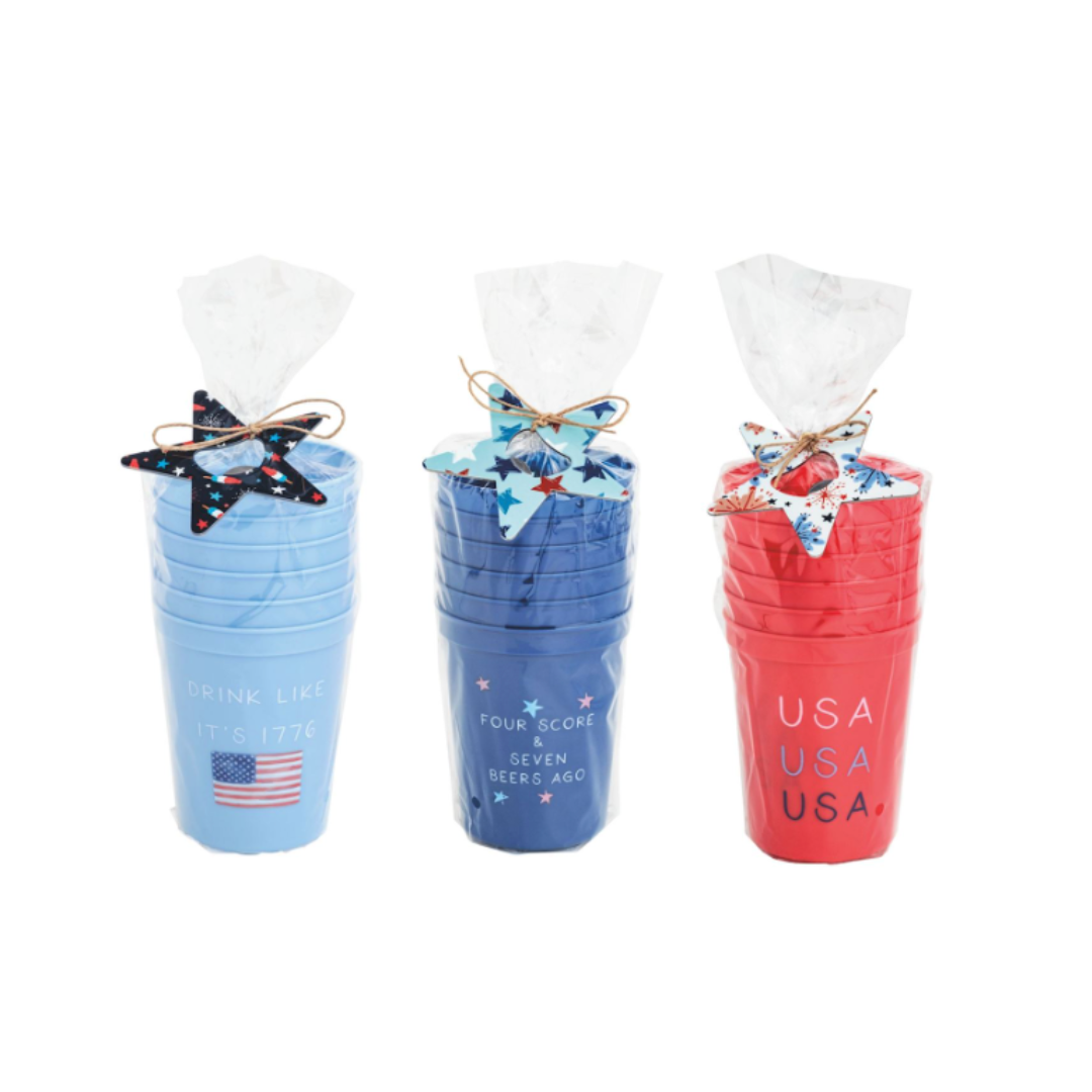 Set of three cups with patriotic designs in blue, red, and white packaging.