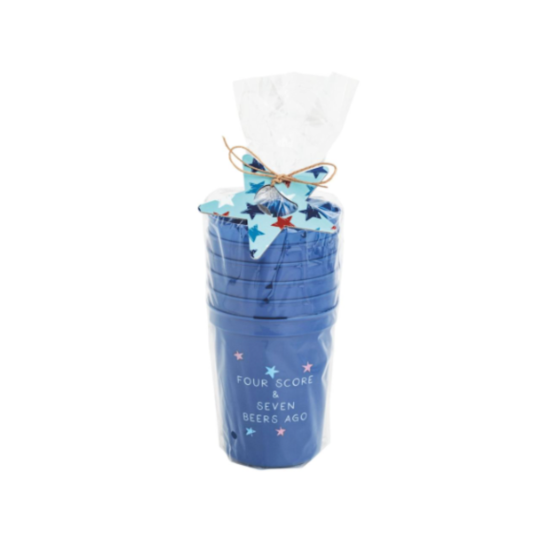 Set of blue tumblers with star design in a clear plastic bag on a white background