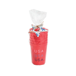 Set of red cups with 'USA' text, tied with a decorative bow on a white background