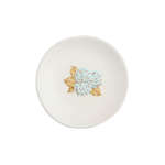 ring dish with floral design on a white background