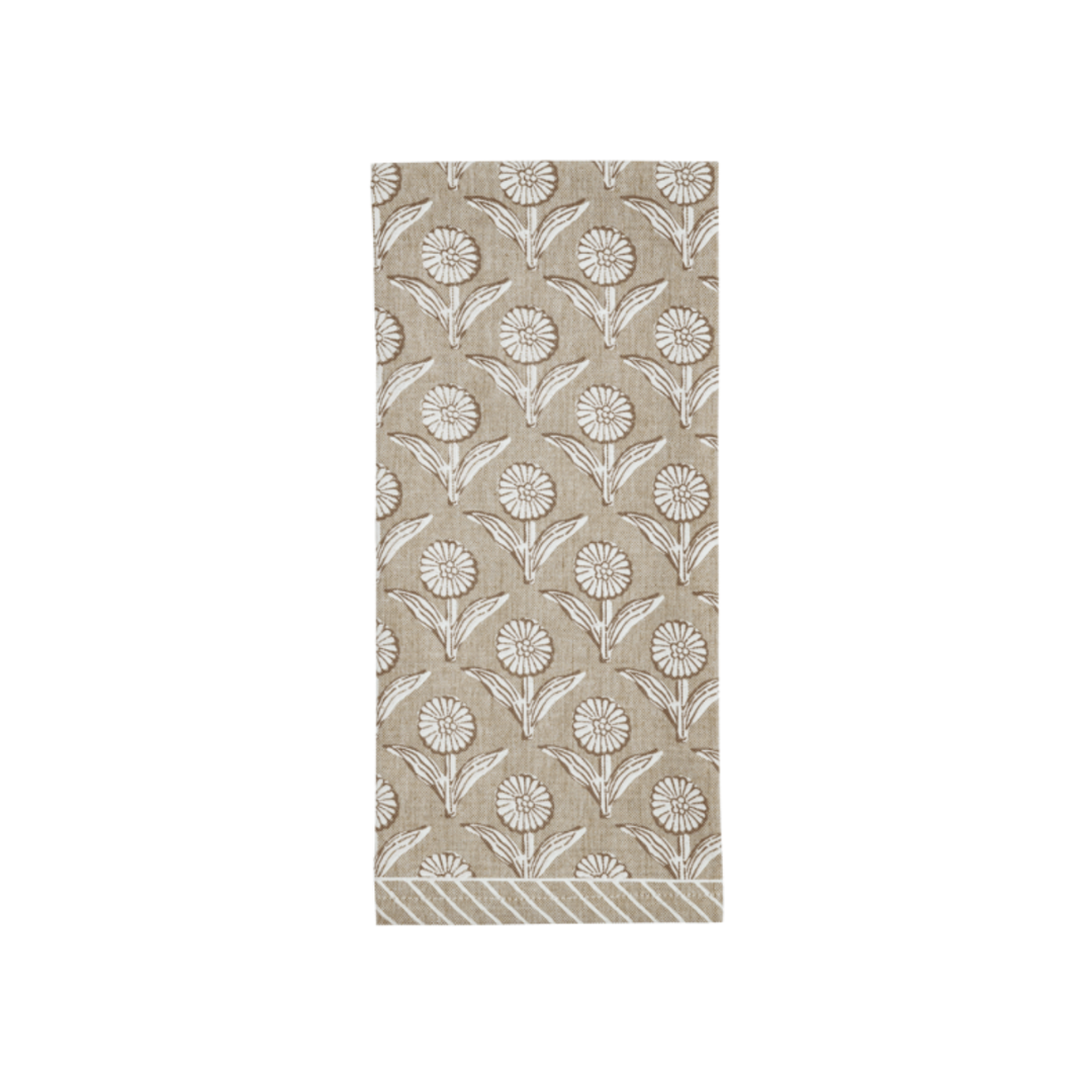 Patterned fabric hand towel with floral design on a white background
