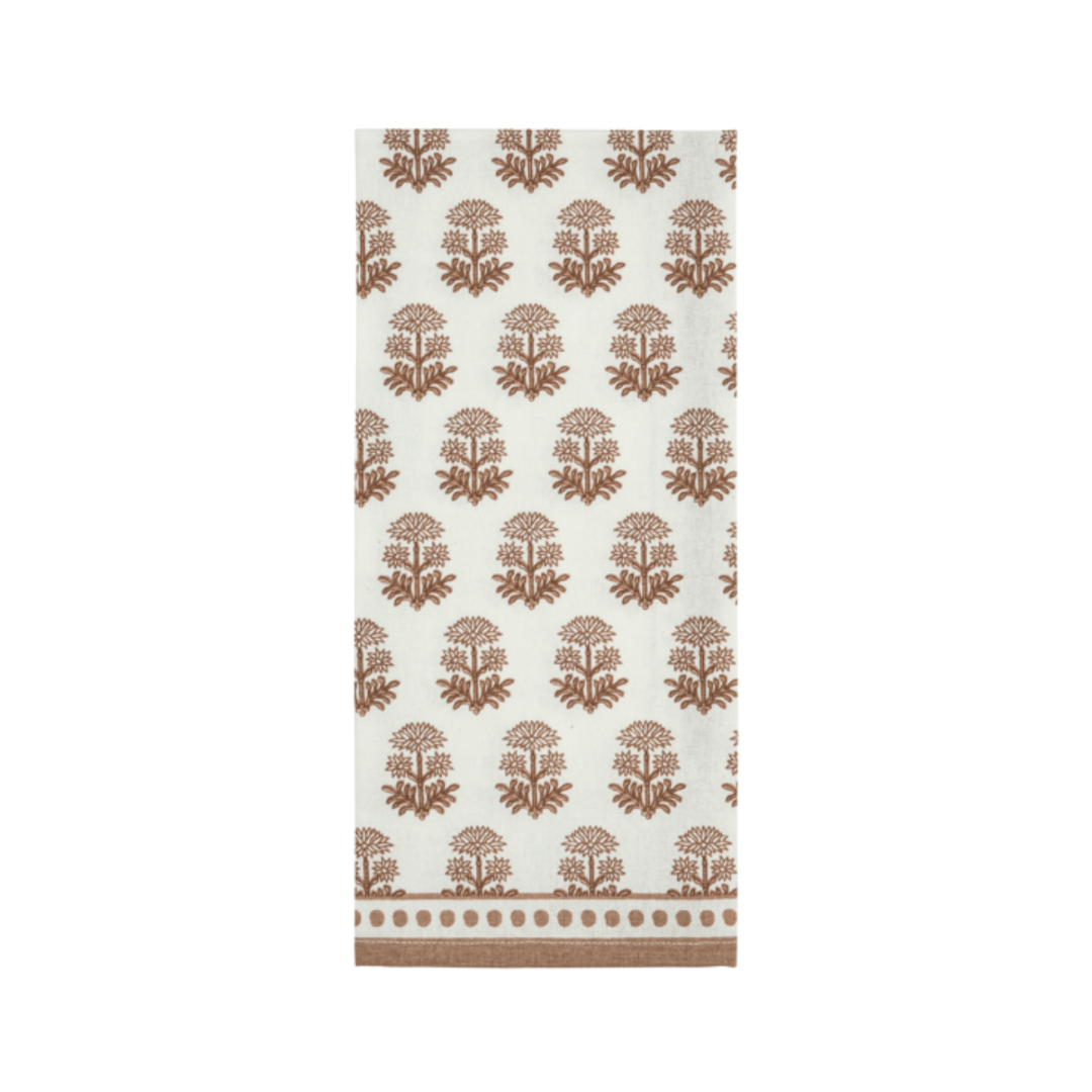 White towel with brown tree pattern on a white background