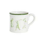 White mug with green rim and handle, featuring illustrations of a person playing golf on a white background.