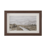 Framed landscape painting of a road leading to mountains on a white background