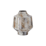 Decorative vase with a textured surface on a white background
