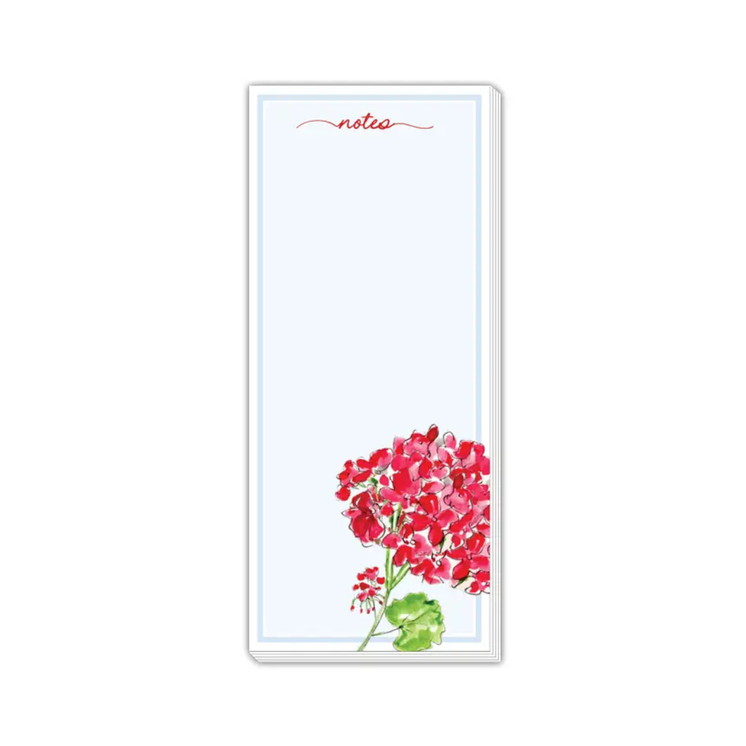 Notepad with red floral design and 'notes' text on a white background