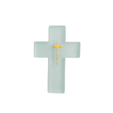 Cross-shaped resin cross with a gold center on a light blue background