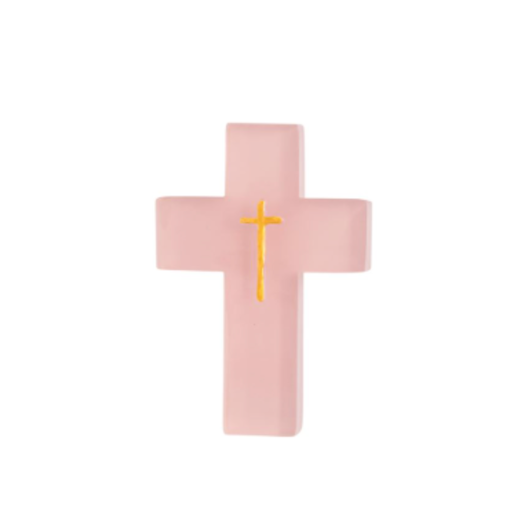 Pink resin cross with a yellow center on a white background