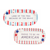 Two patriotic-themed trays with text and star designs on a white background