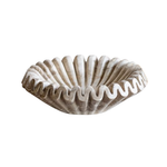 Decorative marble ruffle bowl on a white background