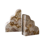 Two marble bookends with a natural pattern on a white background
