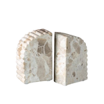 Marble bookends on a white background