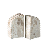Marble bookends on a white background