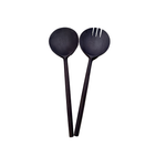 Two dark brown wooden salad servers with different ends on a white background