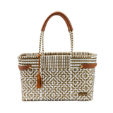 Woven handbag with geometric pattern and brown handles on a white background