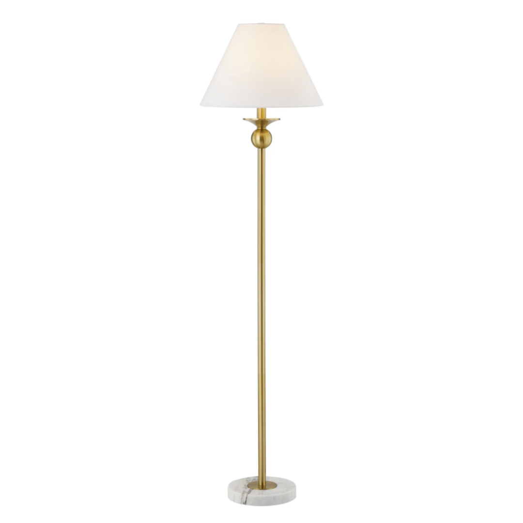 Floor lamp with a white shade and gold base on a white background