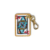 An embroidered keychain charm of a playing card queen with a gold border and a gold metal clasp, shown on a plain white background.