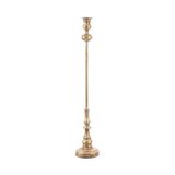 A tall, slender brass candlestick holder with a decorative tiered base and a flared top, shown against a plain white background.