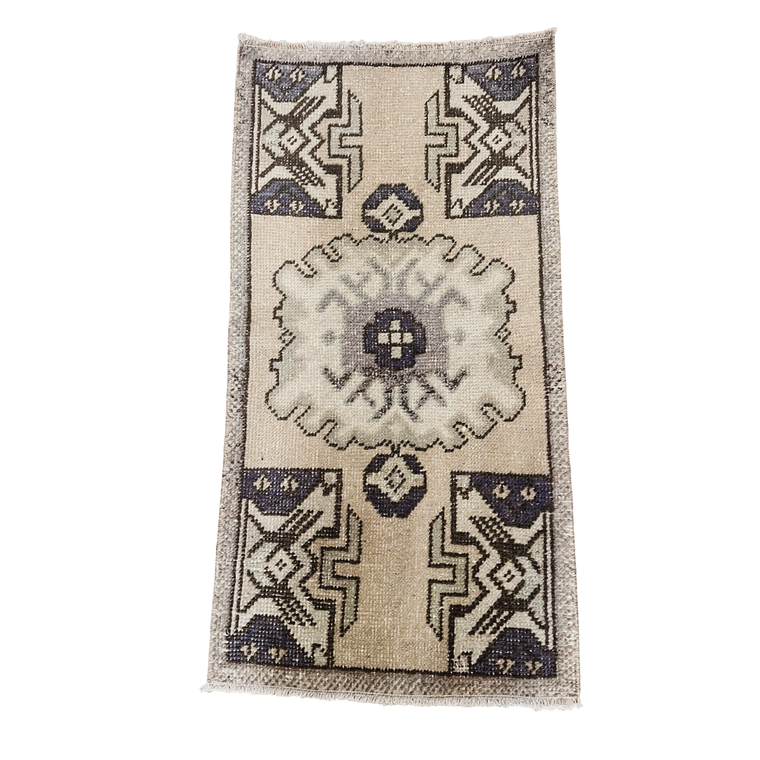 Decorative rug with geometric pattern on a white background