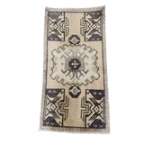 Decorative rug with geometric pattern on a white background