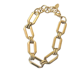 Gold chain bracelet on a white background