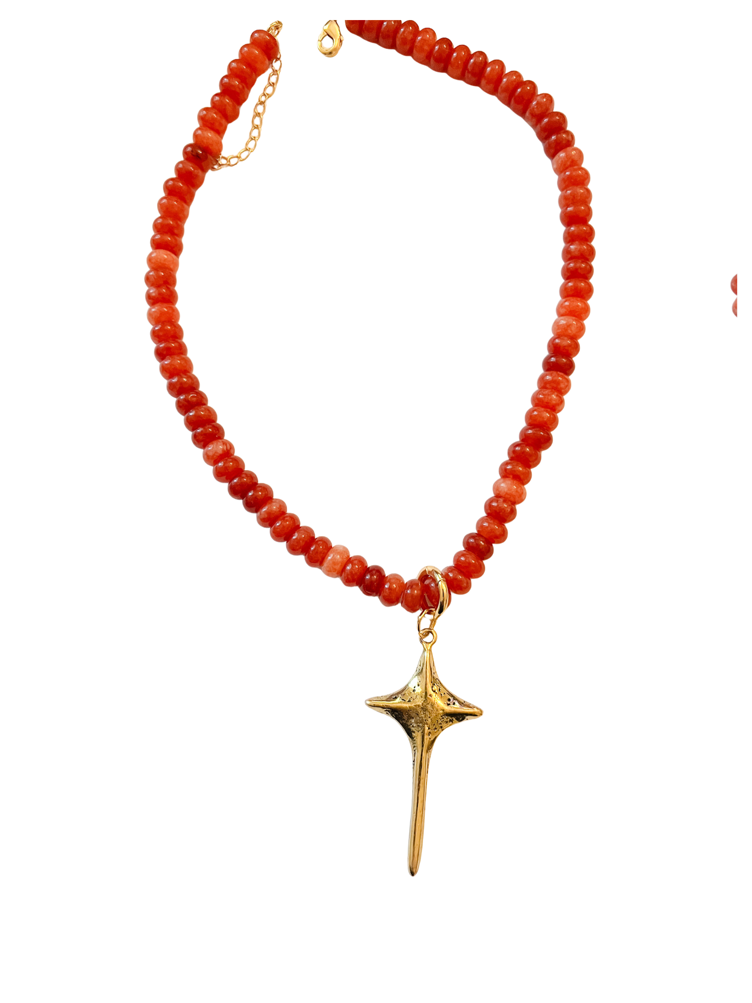 Necklace with red beads and a gold star-shaped pendant on a white background