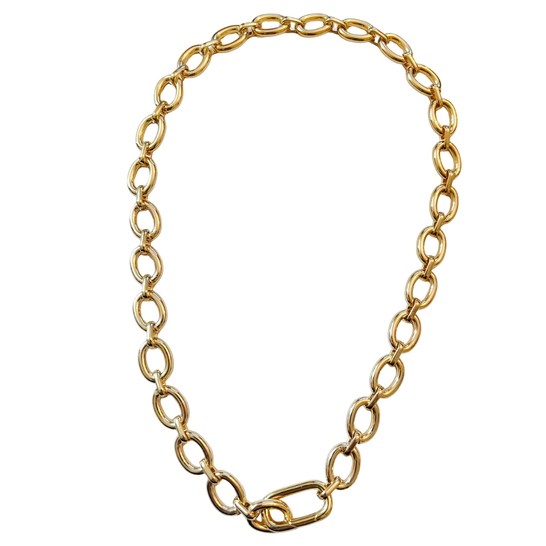 Gold chain necklace on a white background