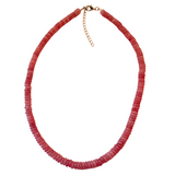 Pink beaded necklace on a white background