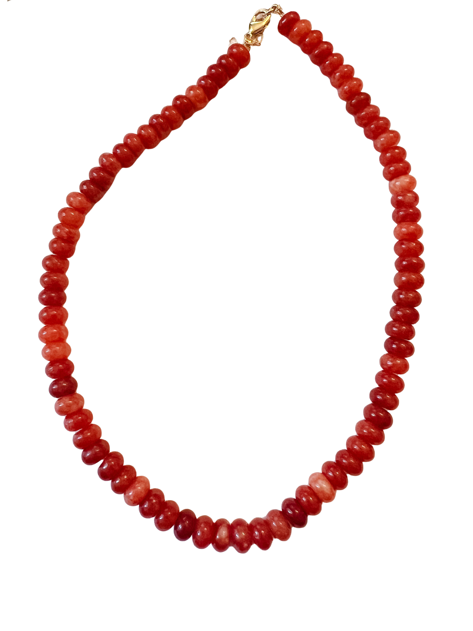 Red beaded necklace on a white background