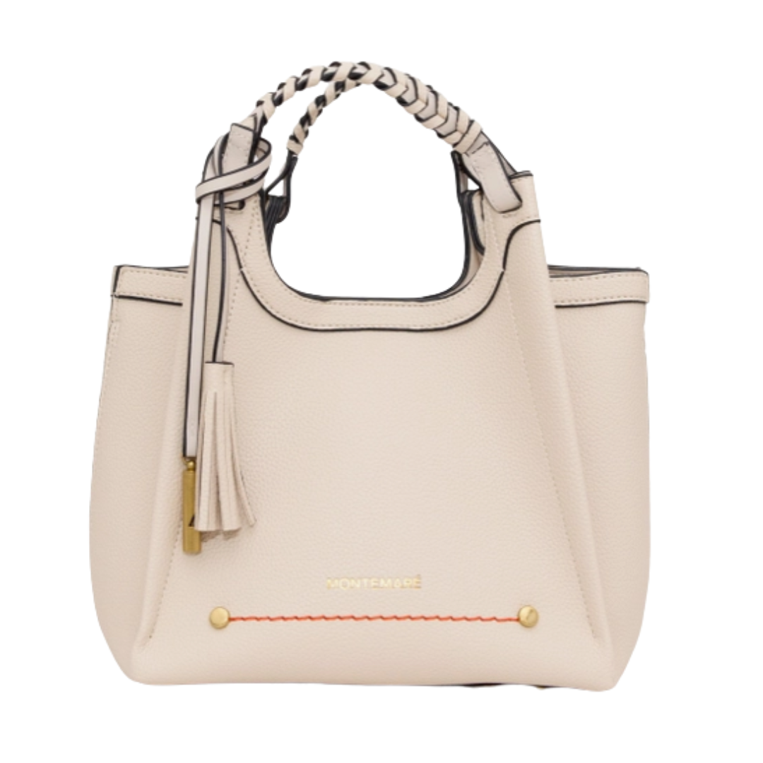 Beige handbag with a decorative handle and tassel on a white background