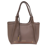 Brown handbag with braided handle and tassel on a white background