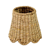 Handwoven scalloped seagrass lampshade for rechargeable lamp, featuring natural woven texture and soft curved edges in a neutral tone.