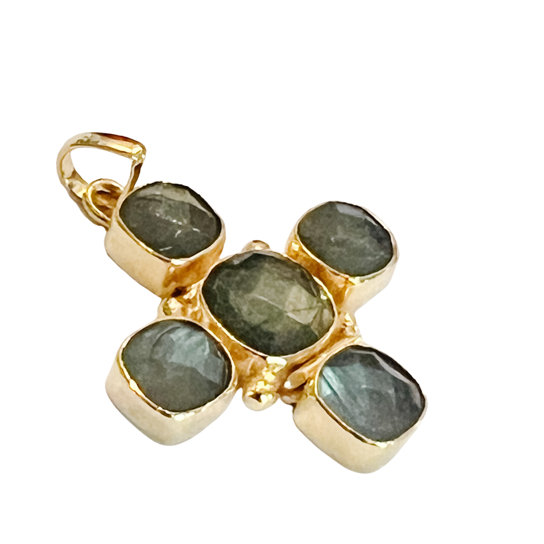 Gold-tone cross charm featuring five faceted natural stones on a white background.